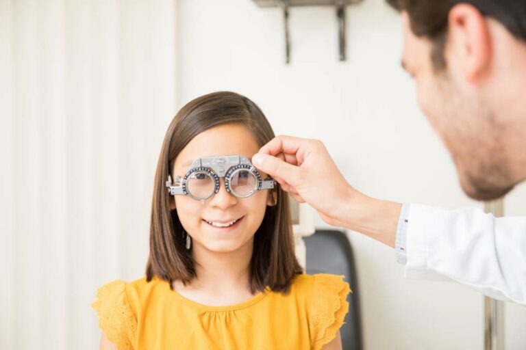 Child having her eyes examined